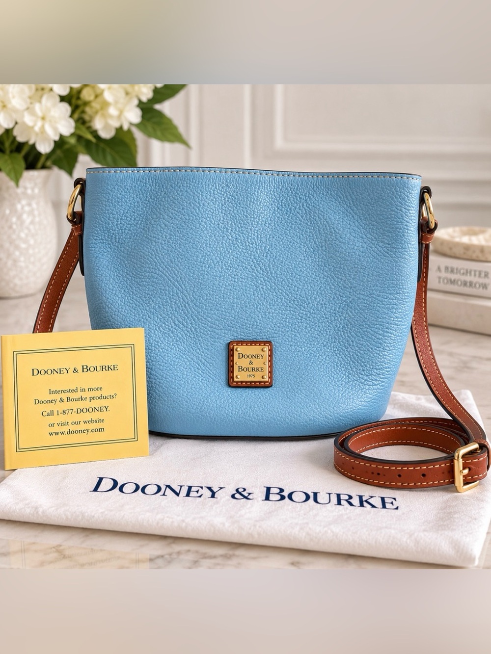 Dooney & Bourke Sky Blue Pebble Leather Crossbody with Brown Strap